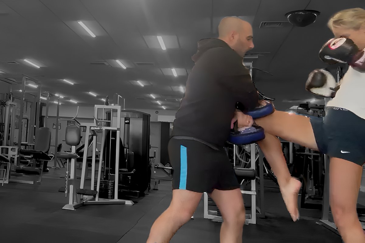 Knee strike drill during padwork